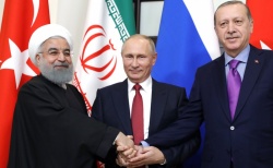 Recep Tayyip Erdogan, en compagnie de Vladimir Poutin et Hassan Rohani
